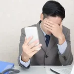 高額な原状回復費に困っている様子を表現したイメージ画像